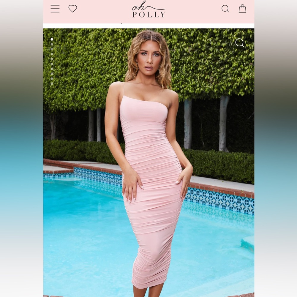 Pretty mauve pink OhPolly dress worn once. Figure hugging, flattering ruched.